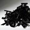 My Response to the DipEd, 2009, Cut and coldworked 3mm black glass letters, glued into a stack. Collected and lives in Melbourne.