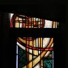 Stained and painted glass. Images are as if you were walking around the church. This window broken by messanine floor.