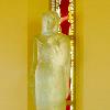 Life size laminated and carved glass figure of the Sacred Heart of Jesus, which stands in front painted, stained and leaded antique glass window.